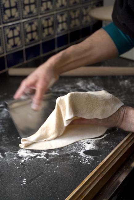 Dough scraper makes it easier to make cracker-crust pizza