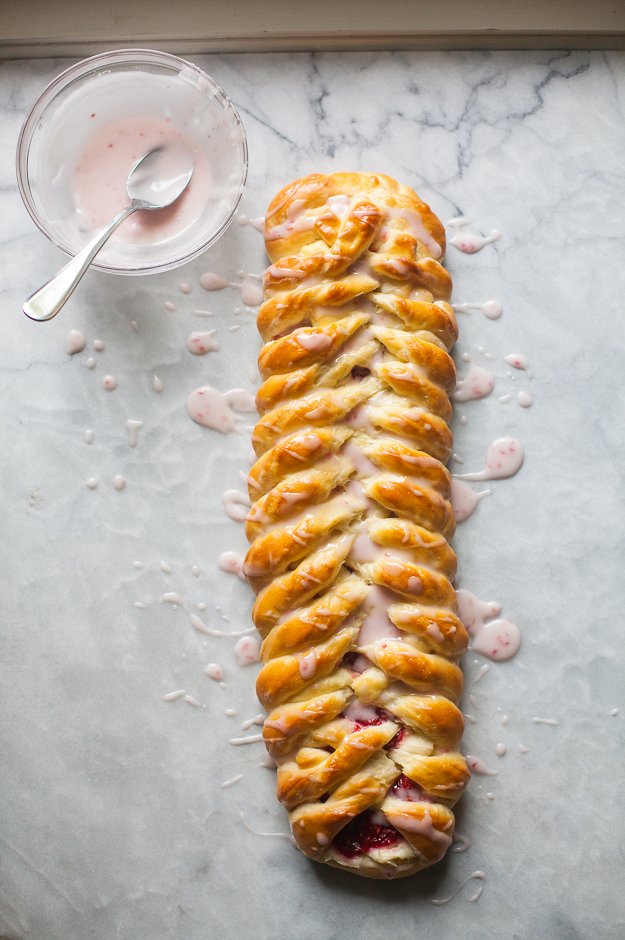 Raspberry Cream Cheese Brioche Braid with Powdered Sugar Drizzle