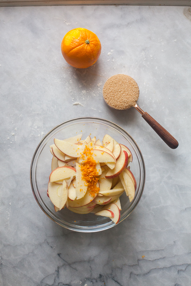 Apples and orange zest in a bowl before adding brown sugar | Artisan Bread in Five Minutes a Day